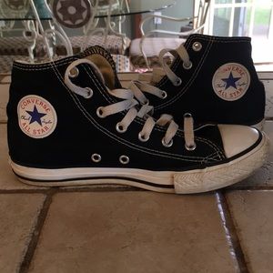 Kid’s Black Converse sneakers